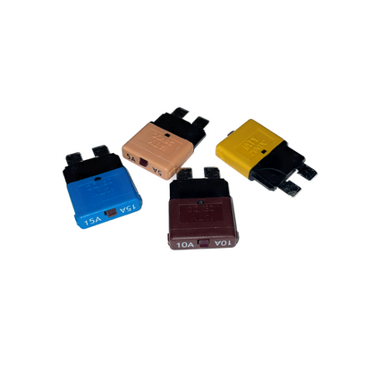 Fusibile a lama automatico reinseribile con pulsante